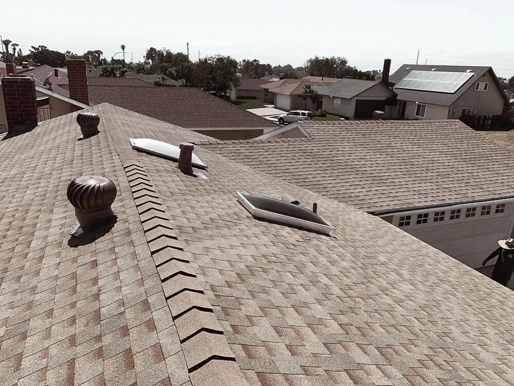 A finished asphalt shingle roof by Chavez Roofing