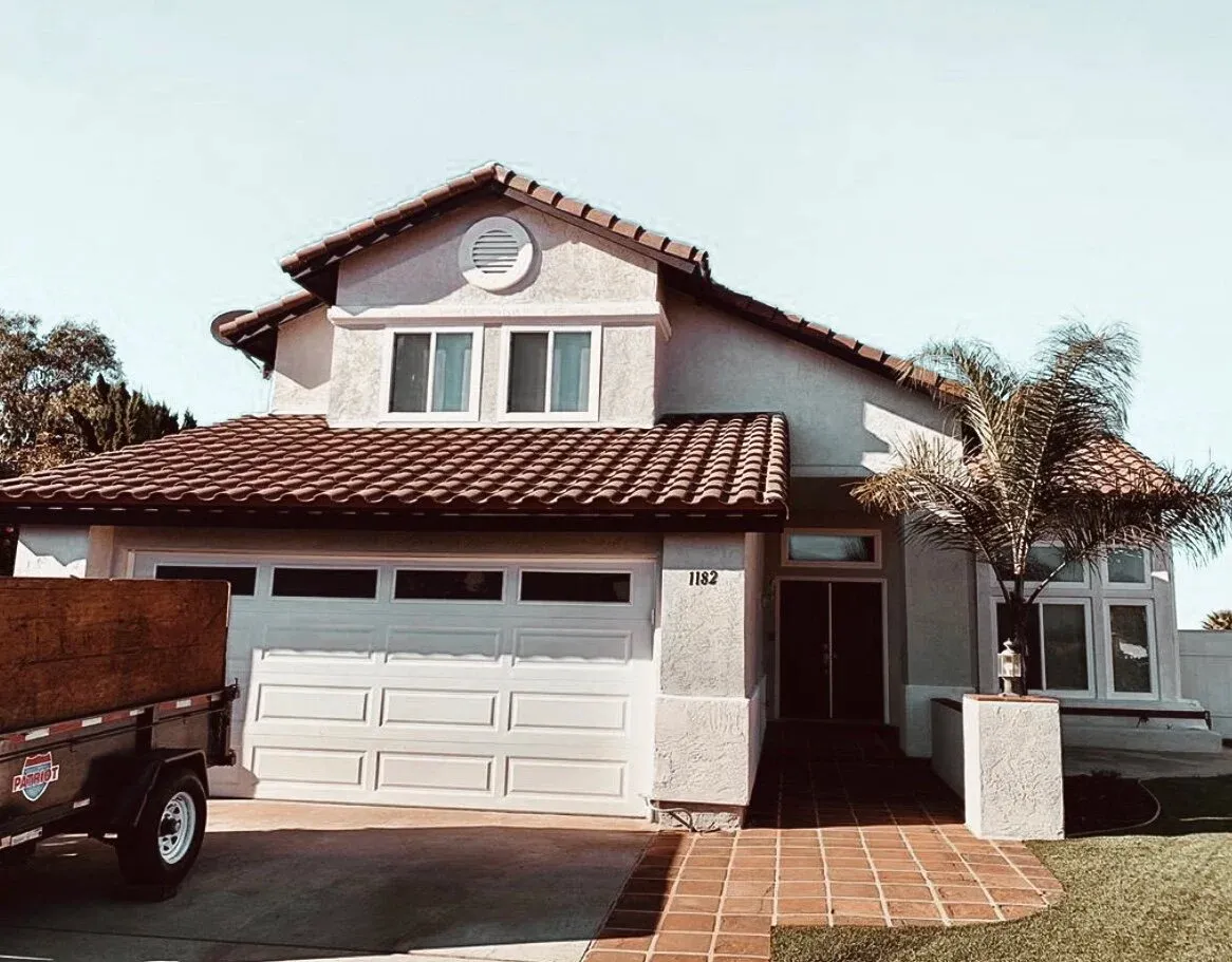 A home with a finished tile roof by Chavez Roofing